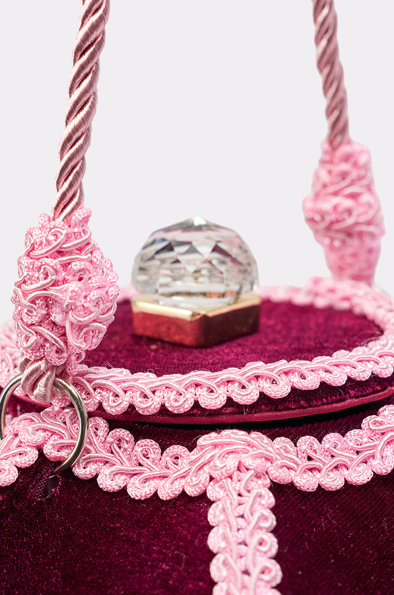 KEEP THE LIGHTS OFF TASSEL PURSE