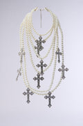 PROTECTED LAYERED CROSS NECKLACE