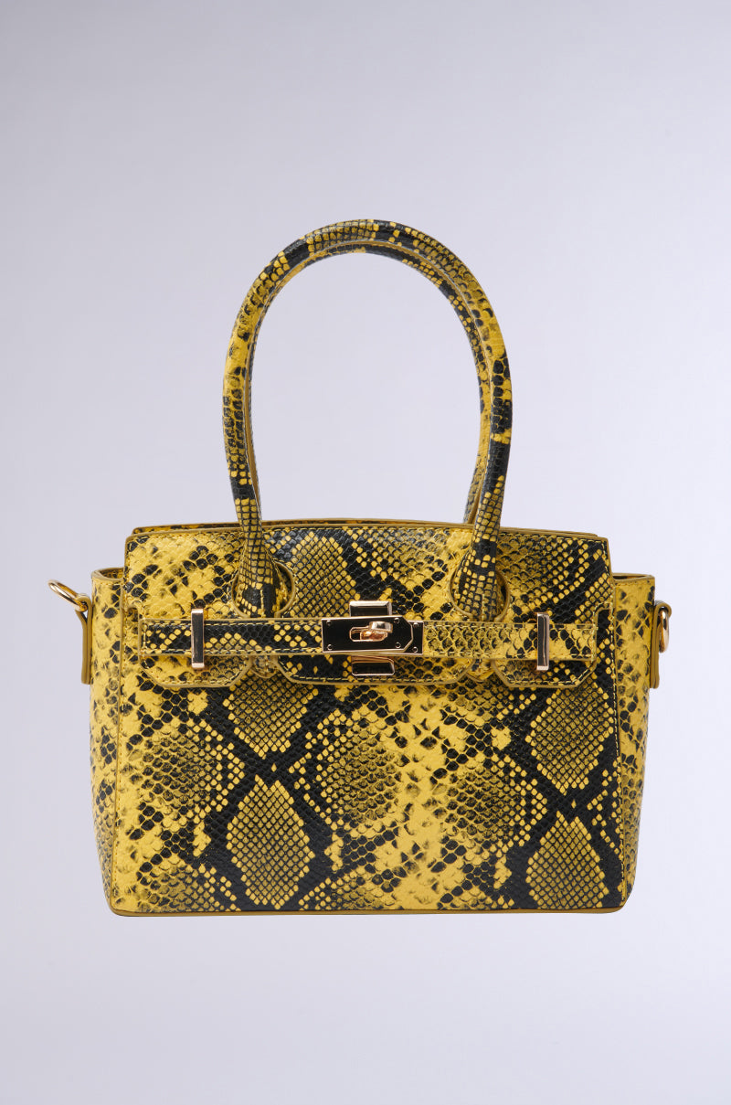 NEVER TYPICAL SNAKE PRINT PURSE