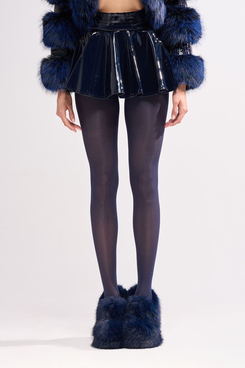 SHE IS ON FIRE FAUX LEATHER MINI SKIRT IN NAVY
