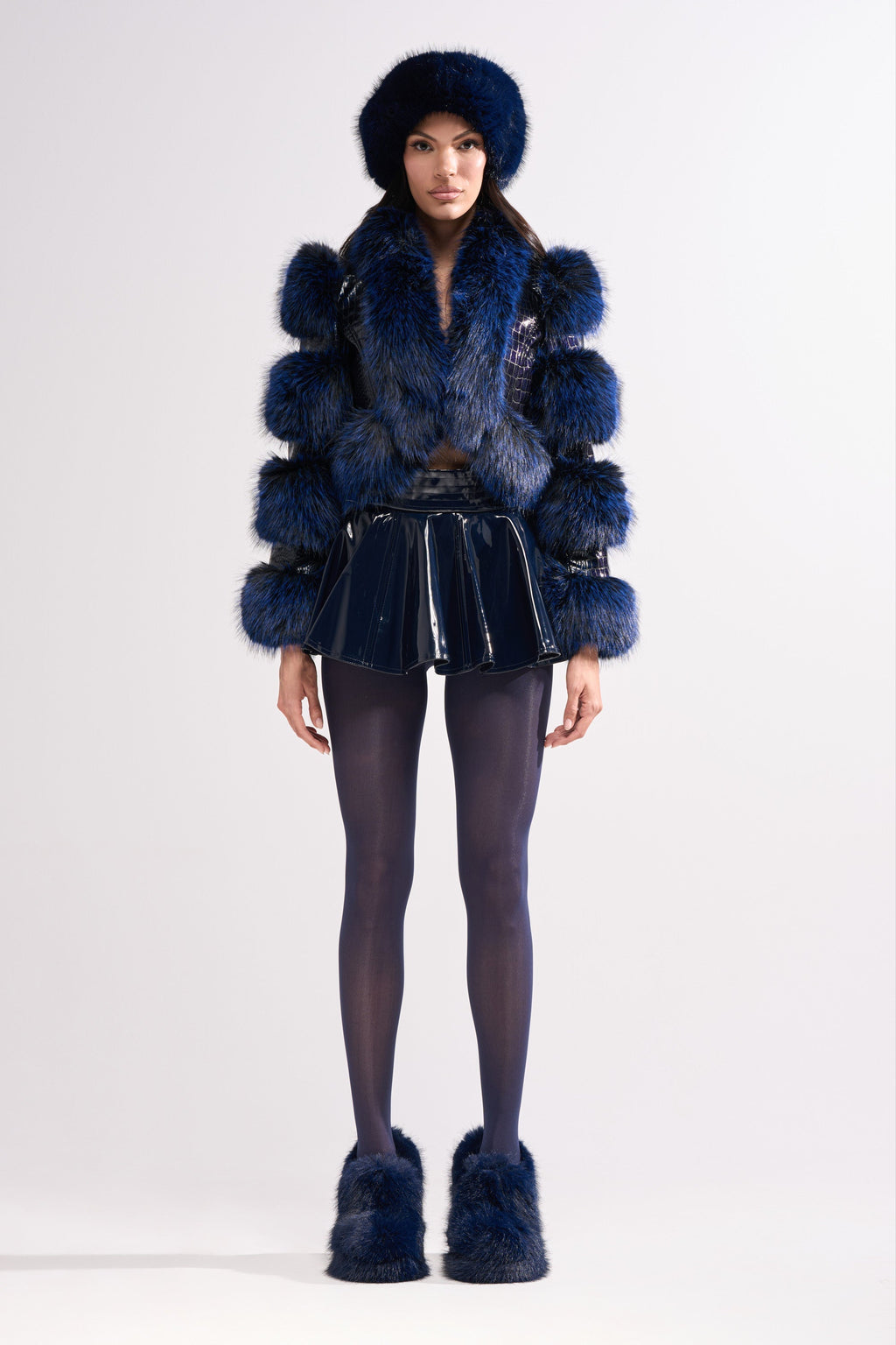 SHE IS ON FIRE FAUX LEATHER MINI SKIRT IN NAVY
