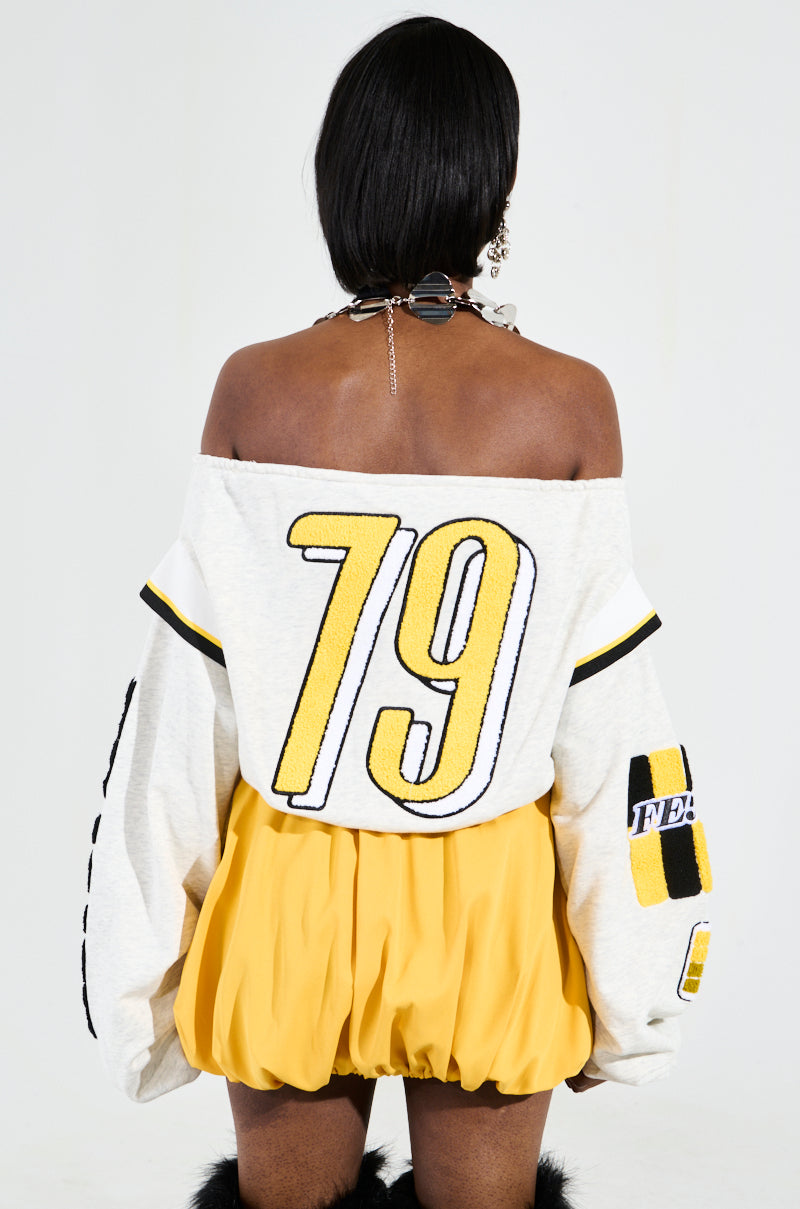 RACING THROUGH OFF THE SHOULDER SWEATSHIRT