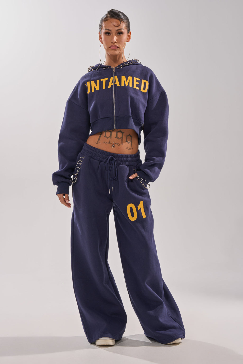 UNTAMED METAL RING SWEATSHIRT