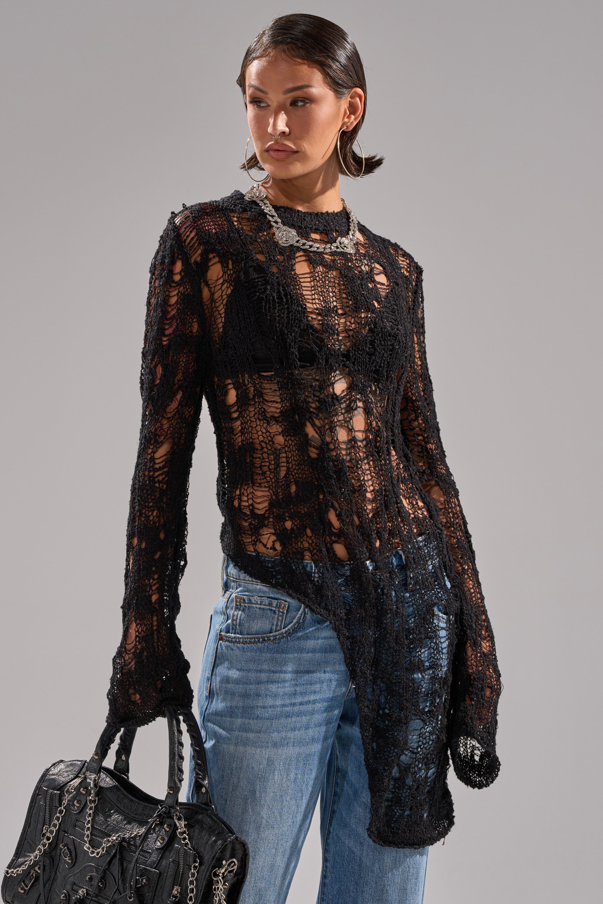 ASYMMETRICAL KNIT SWEATER