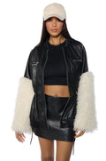 A LITTLE BIT MORE PU JACKET WITH FAUX FUR SLEEVES AND CINCHED WAIST DETAILING