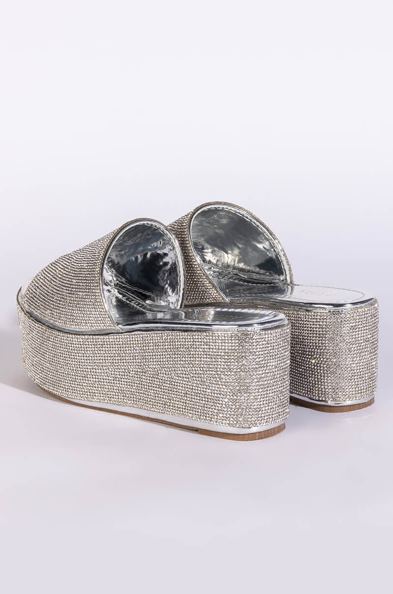 AND ANOTHER ONE SLIP ON FLATFORM SANDAL