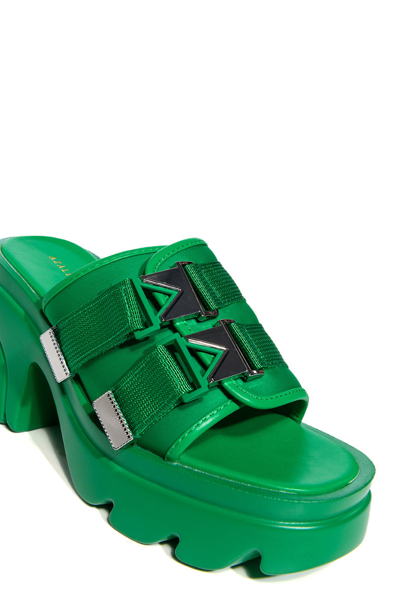 AZALEA WANG WICKER SLIP ON MULE IN GREEN