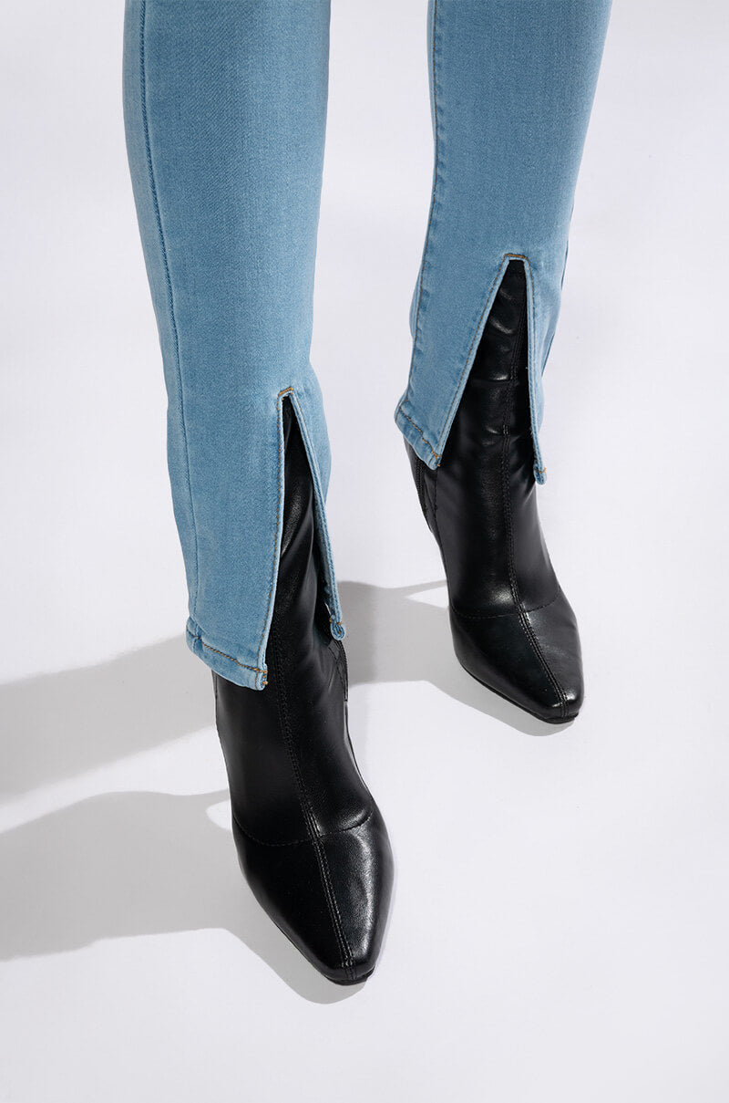 NIGHTFALL MID RISE SKINNY JEANS WITH FRONT SLIT