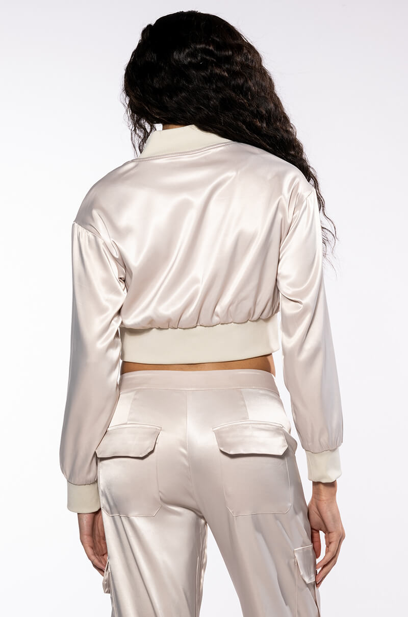 NOTHING BUT TROUBLE ZIP UP SATIN TOP