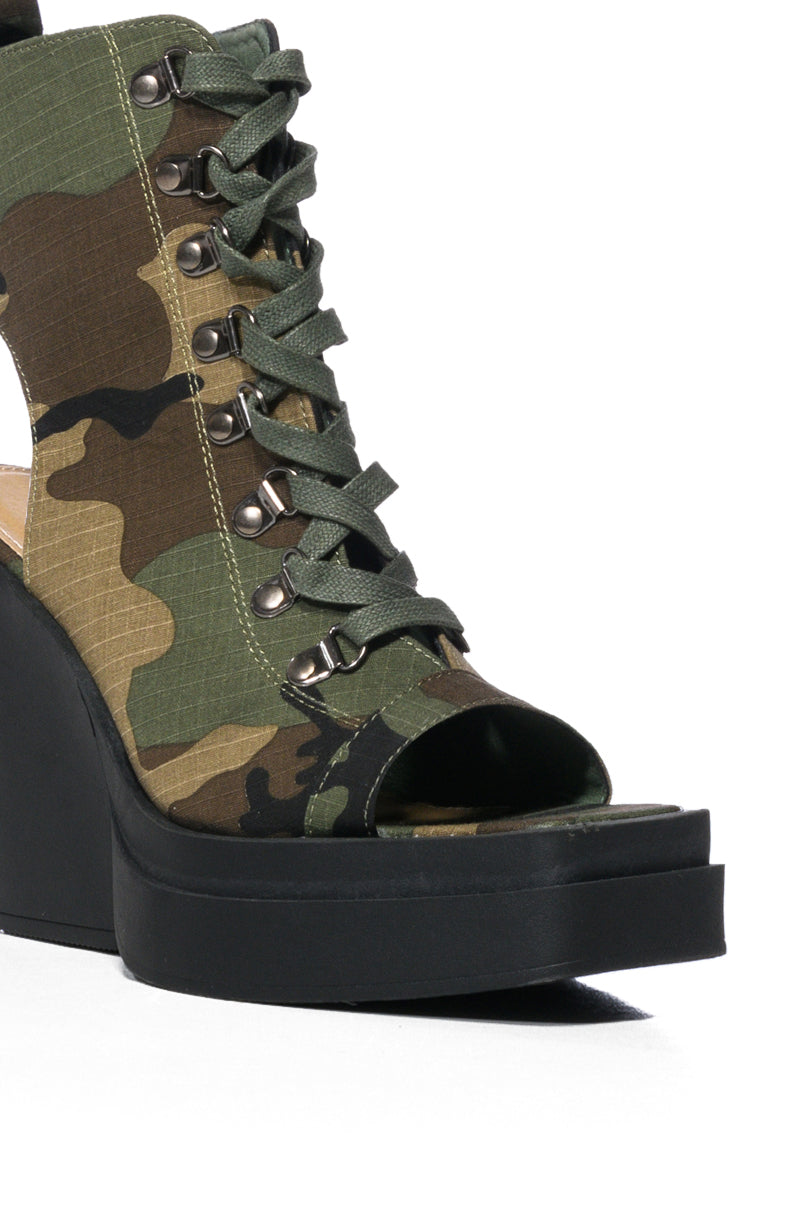 OFF DUTY PEEP TOE BOOTIE IN CAMO