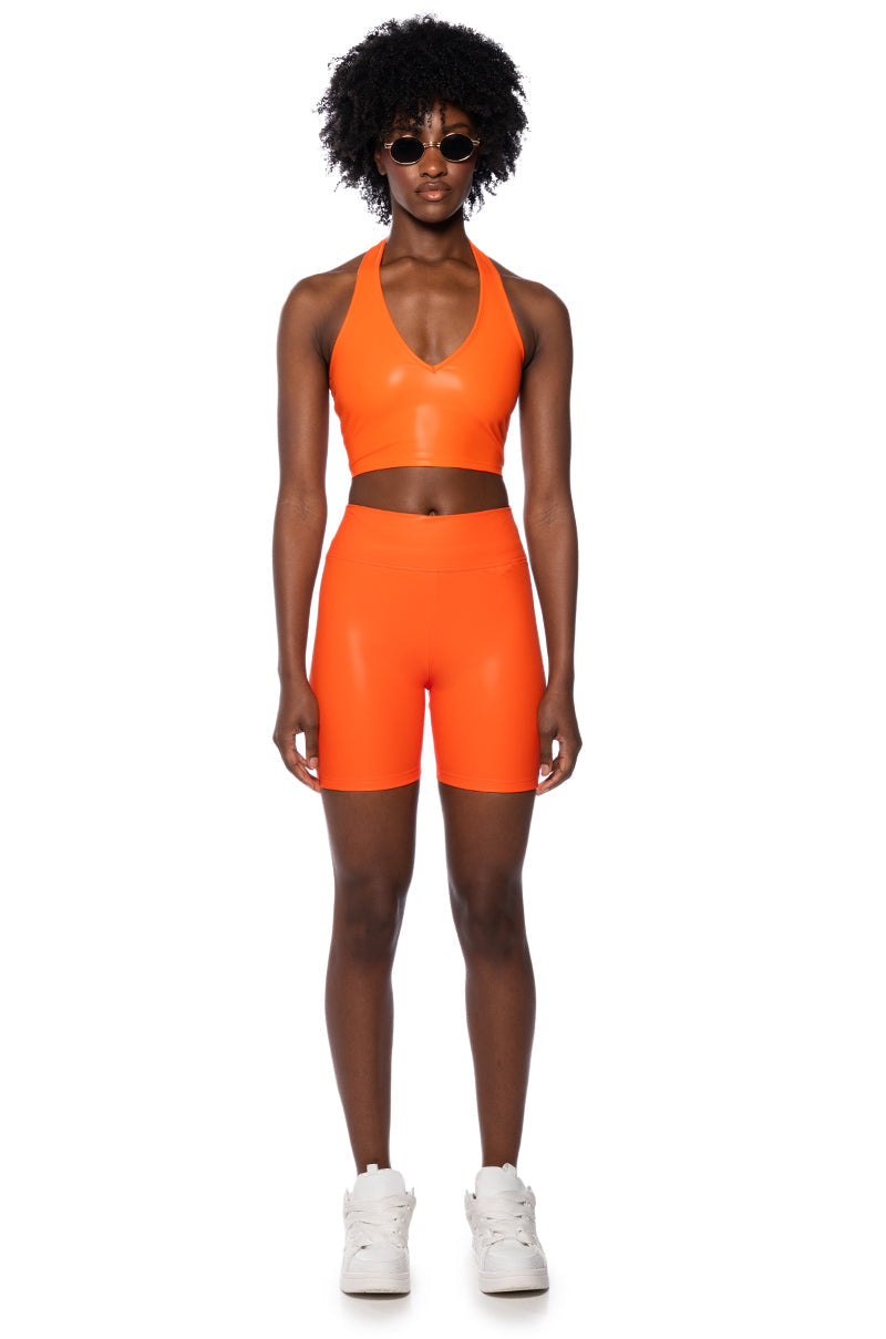RIO FAUX LEATHER BIKER SHORT IN ORANGE